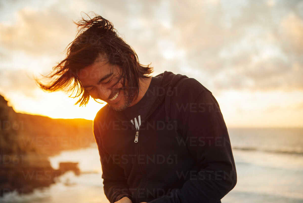 healthy-man-after-40 Middle-aged man standing in morning sunlight to support energy and circadian rhythm
